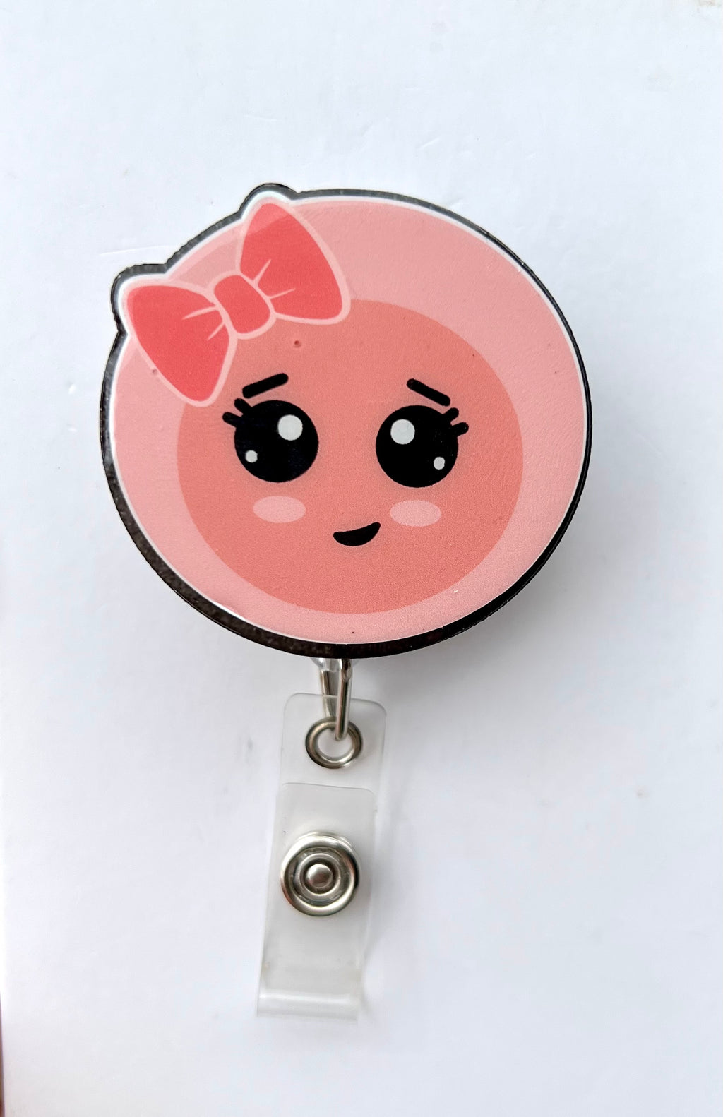 Embryo interchangeable badge reel