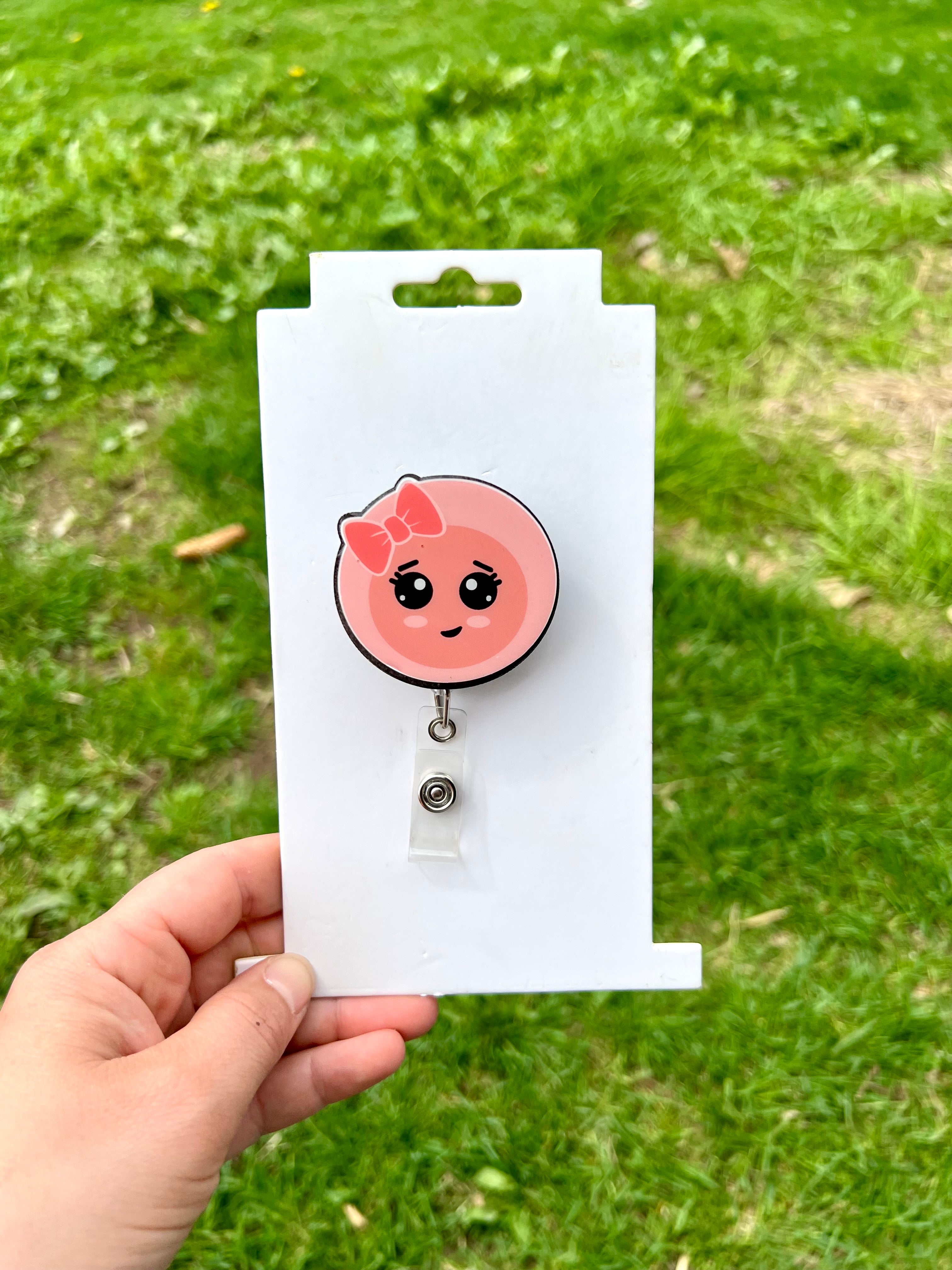 Embryo interchangeable badge reel