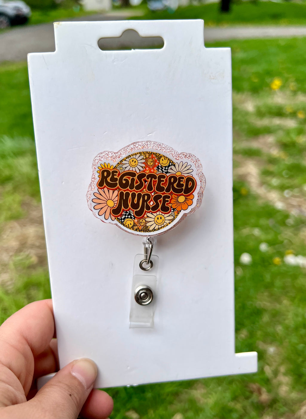 Registered nurse interchangeable badge reel